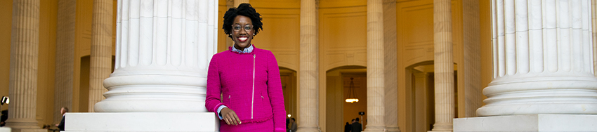 Congresswoman Lauren Underwood stands in the capital building