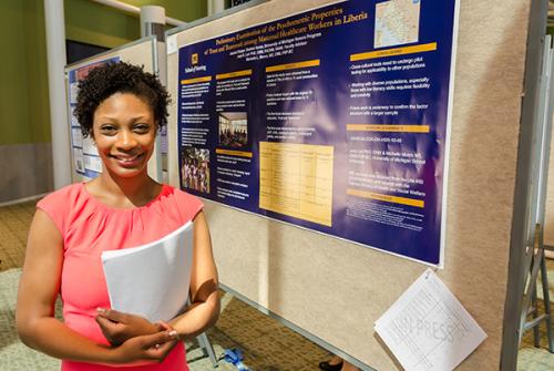 Fladger as a UMSN senior with her Research Day poster