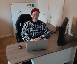 Katie Martin at desk