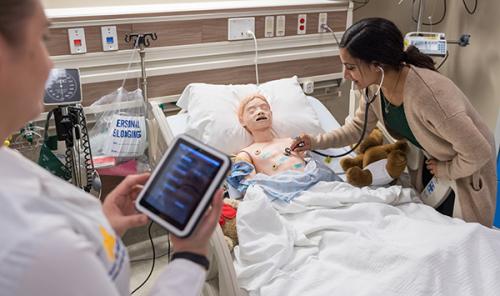 In the CLC, instructors can control the mannequins' vital signs, voice, and much more through tablets and adjacent control rooms.