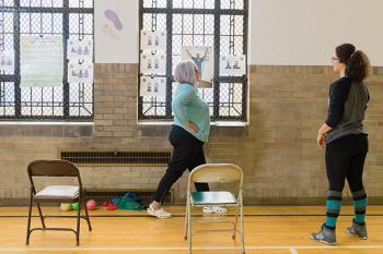 Research Associate Amina Peters keeps a helpful eye on a participant